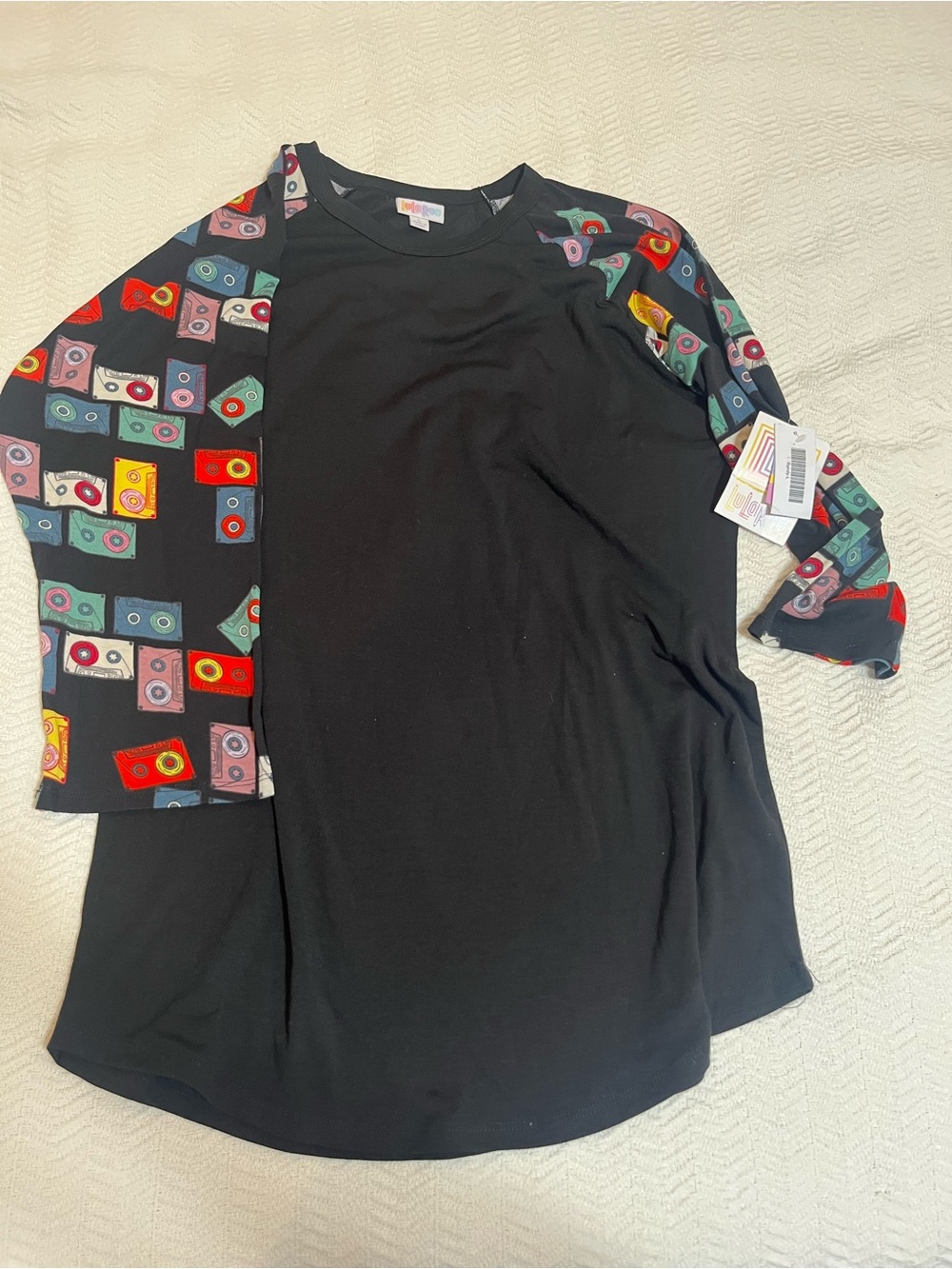 Ladies new with tags Randy LuLaRoe cassette print top